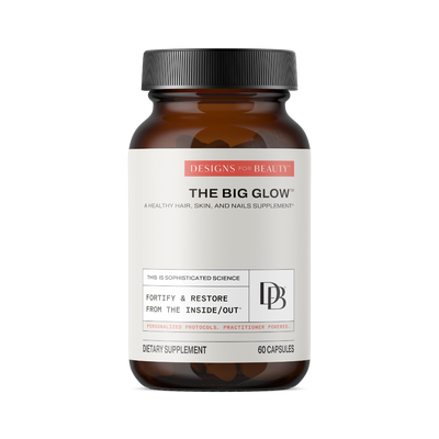 A supplement container of The Big Glow by Designs for Beauty